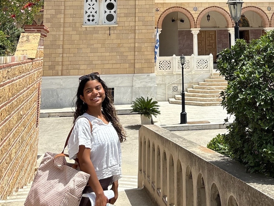 Farah Arian smiling for a picture outside in Greece.