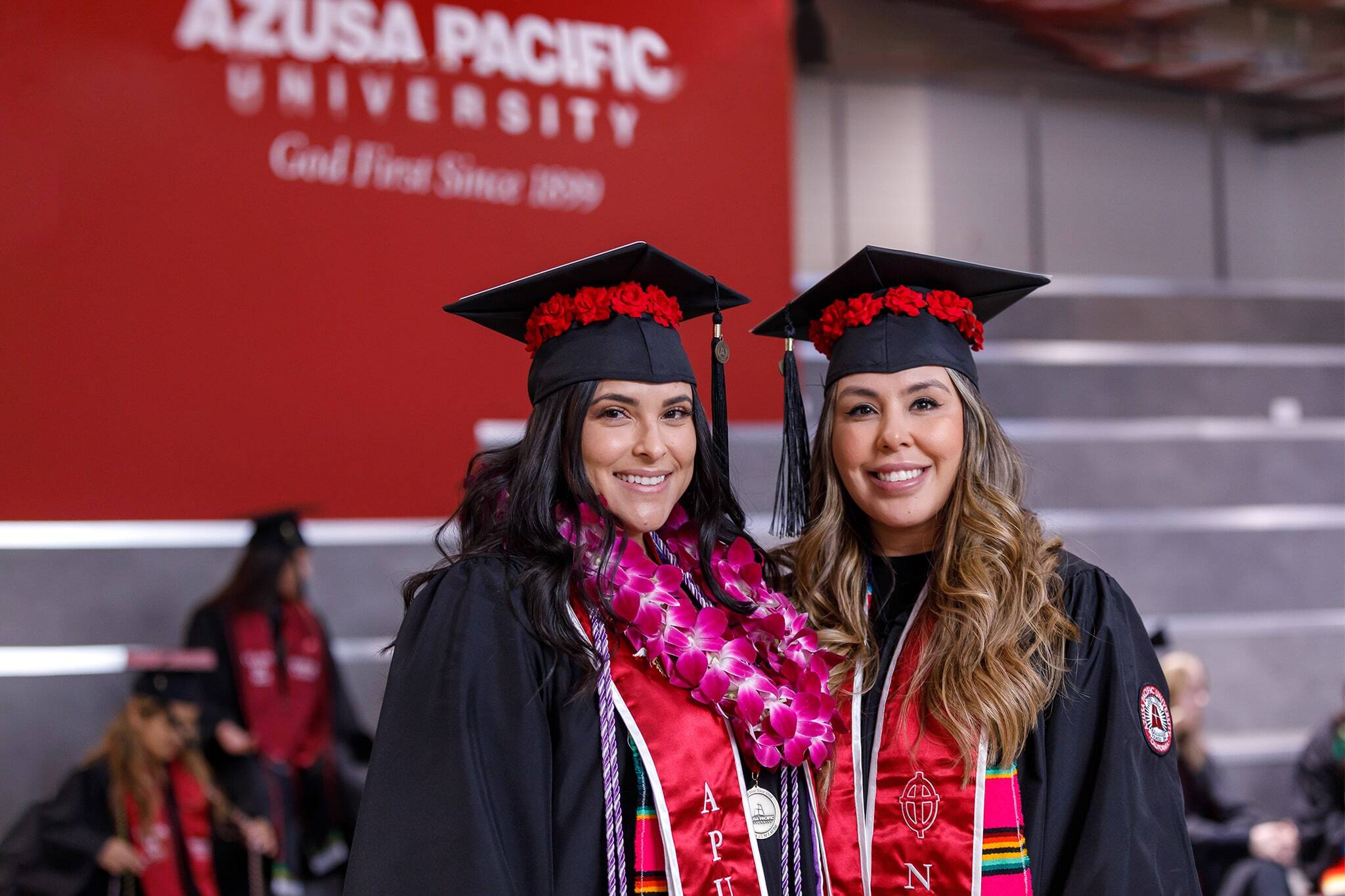Image of two female Latina students smiling