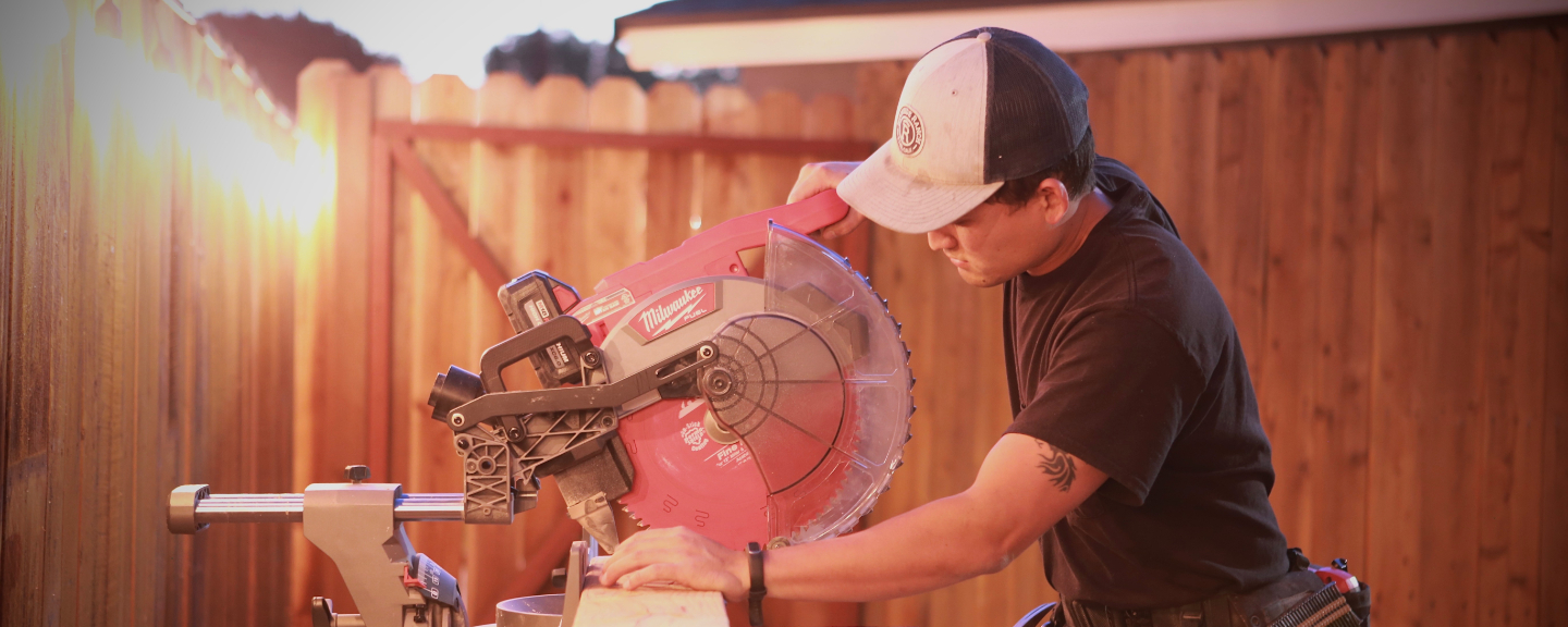 Taylor sawing wood