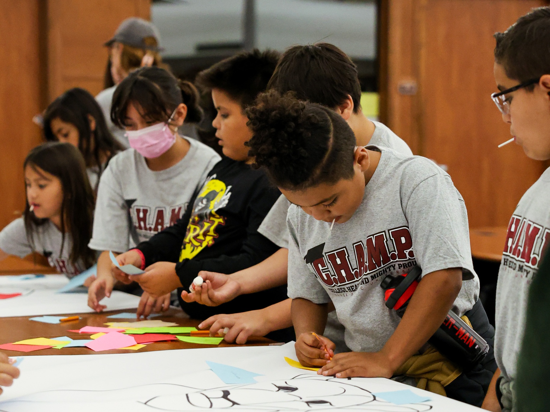 CHAMP students work on an art project