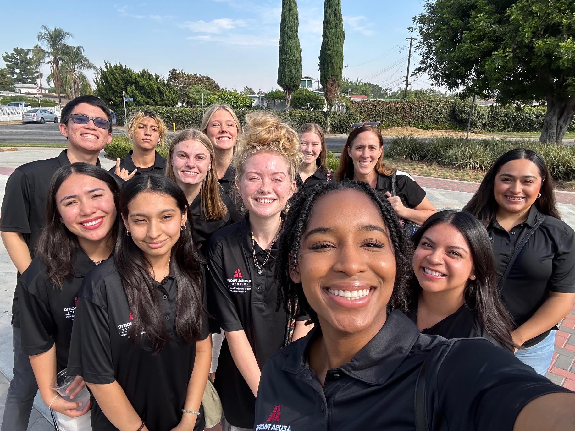 APU Cougar Pals mentors take a selfie outside of GMS