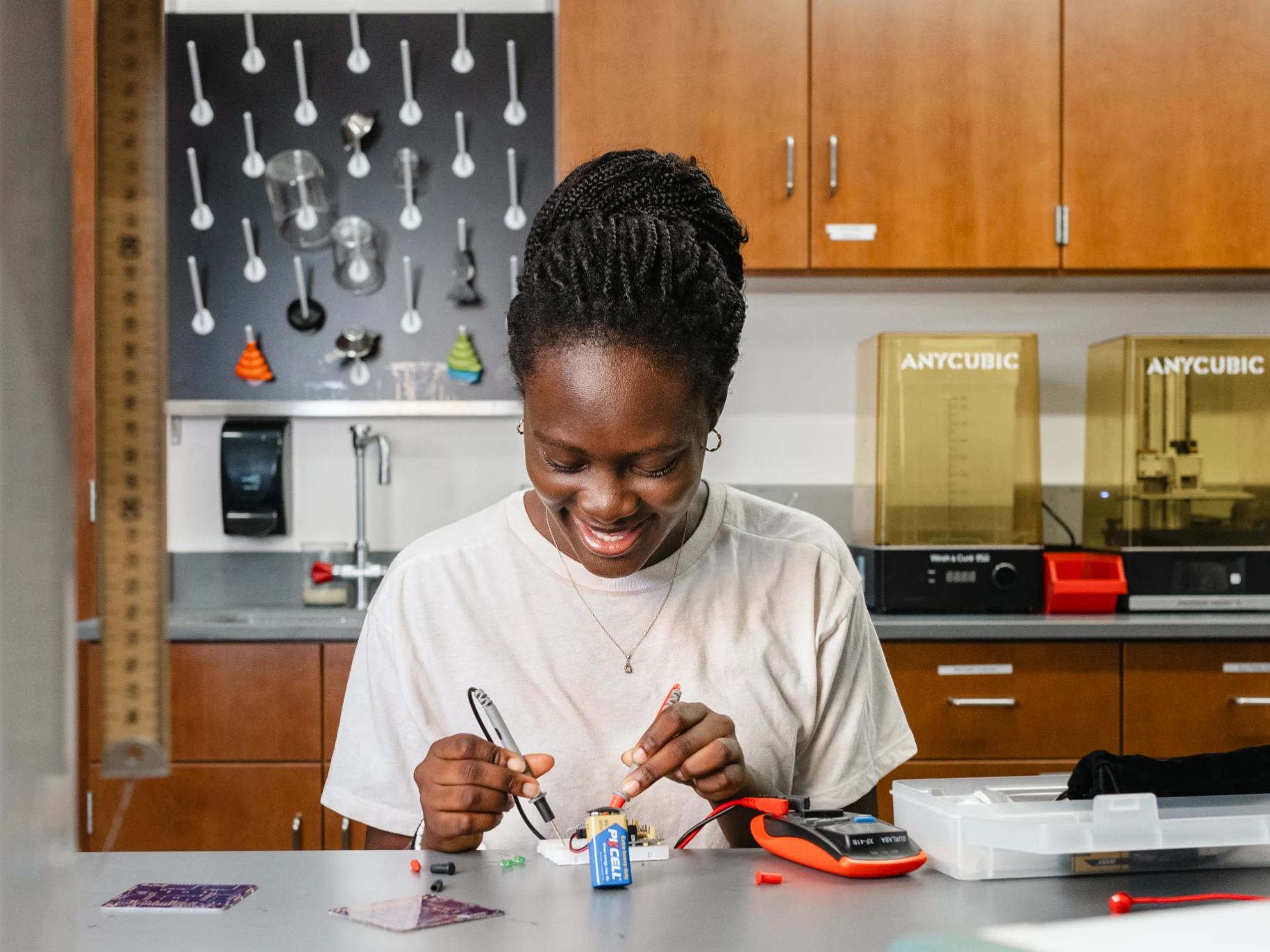 Madey soldering in a lab