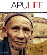 APULIFE front cover of man holding cardboard sign