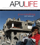 APULIFE front cover of the girl sitting in front of ruins