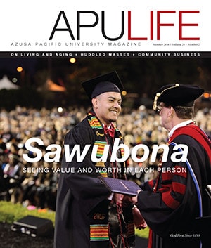 APULIFE front cover of graduate receiving diploma