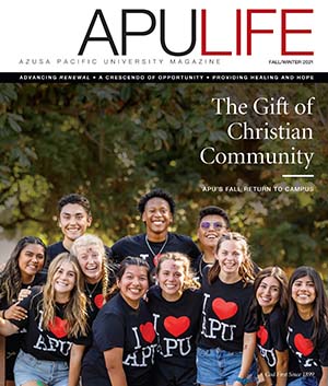 APULIFE front cover of students smiling in I heart APU shirts