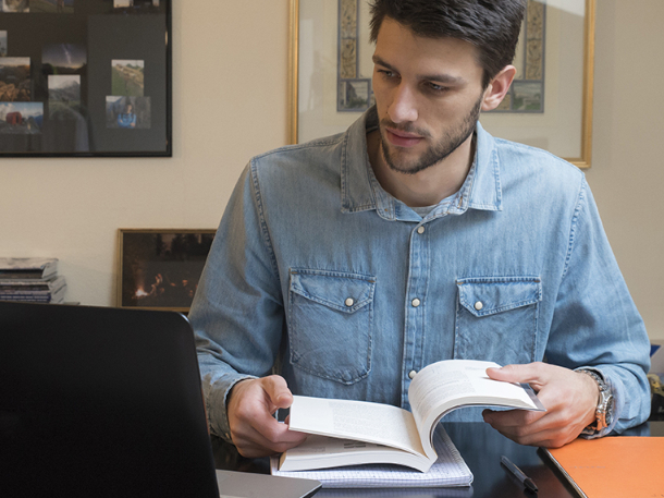 student using his laptop