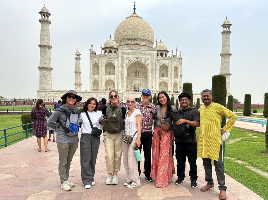 Natalie and her global engagement team outside the Taj Mahal 