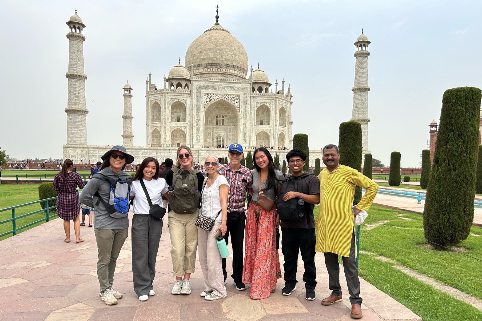 Natalie and her global engagement team outside the Taj Mahal 