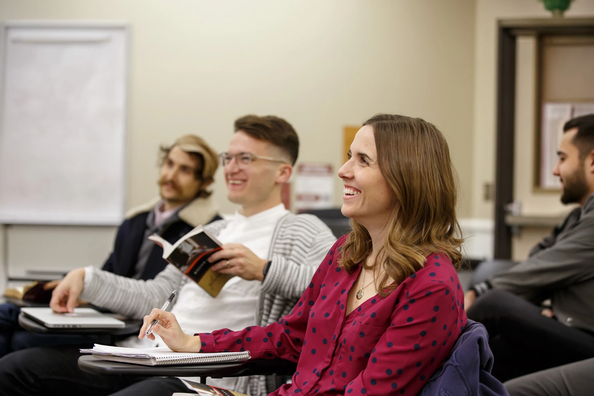 Students laughing in a classroom