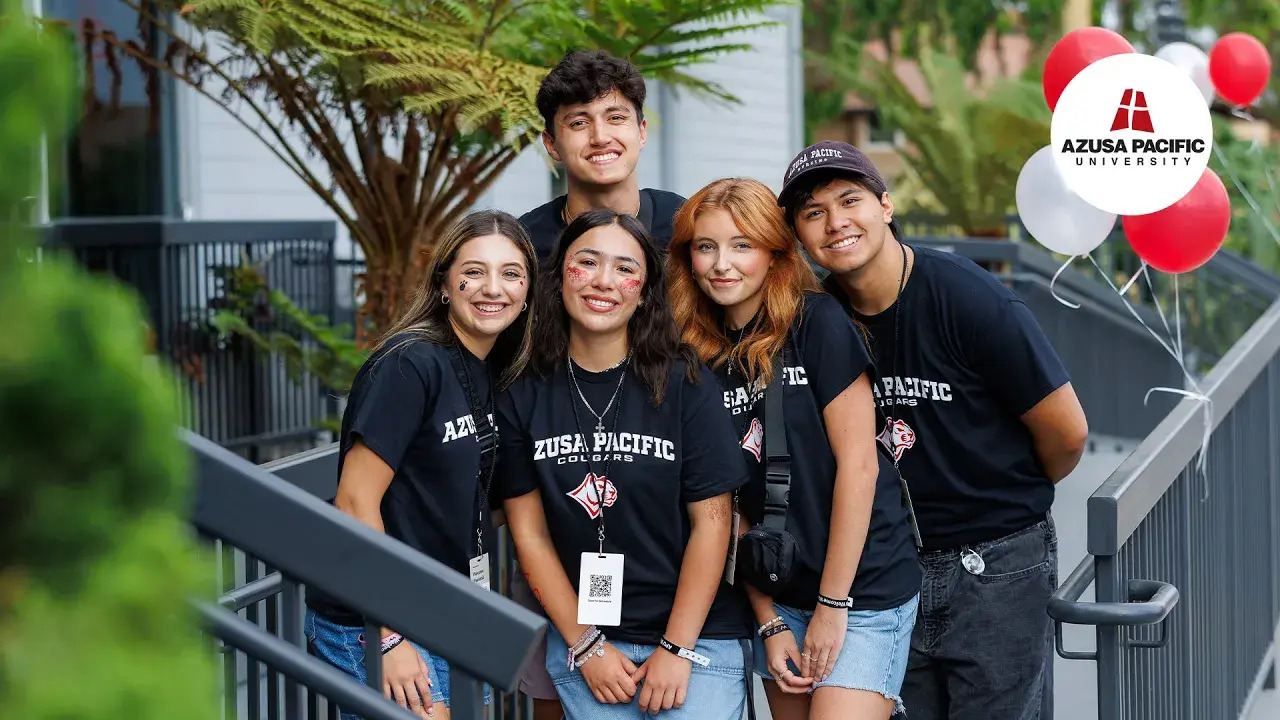 apu students wearing black t-shirts and smiling