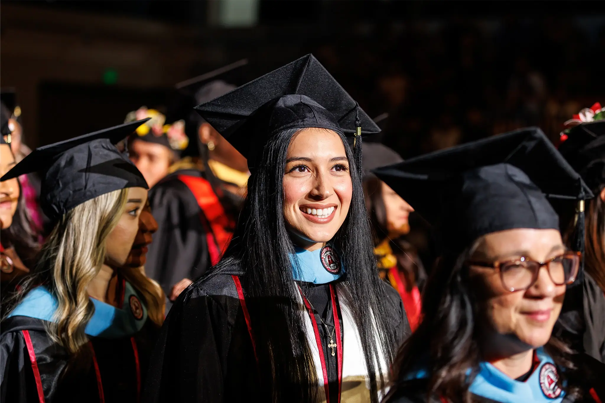 Graduate student in cap and gown