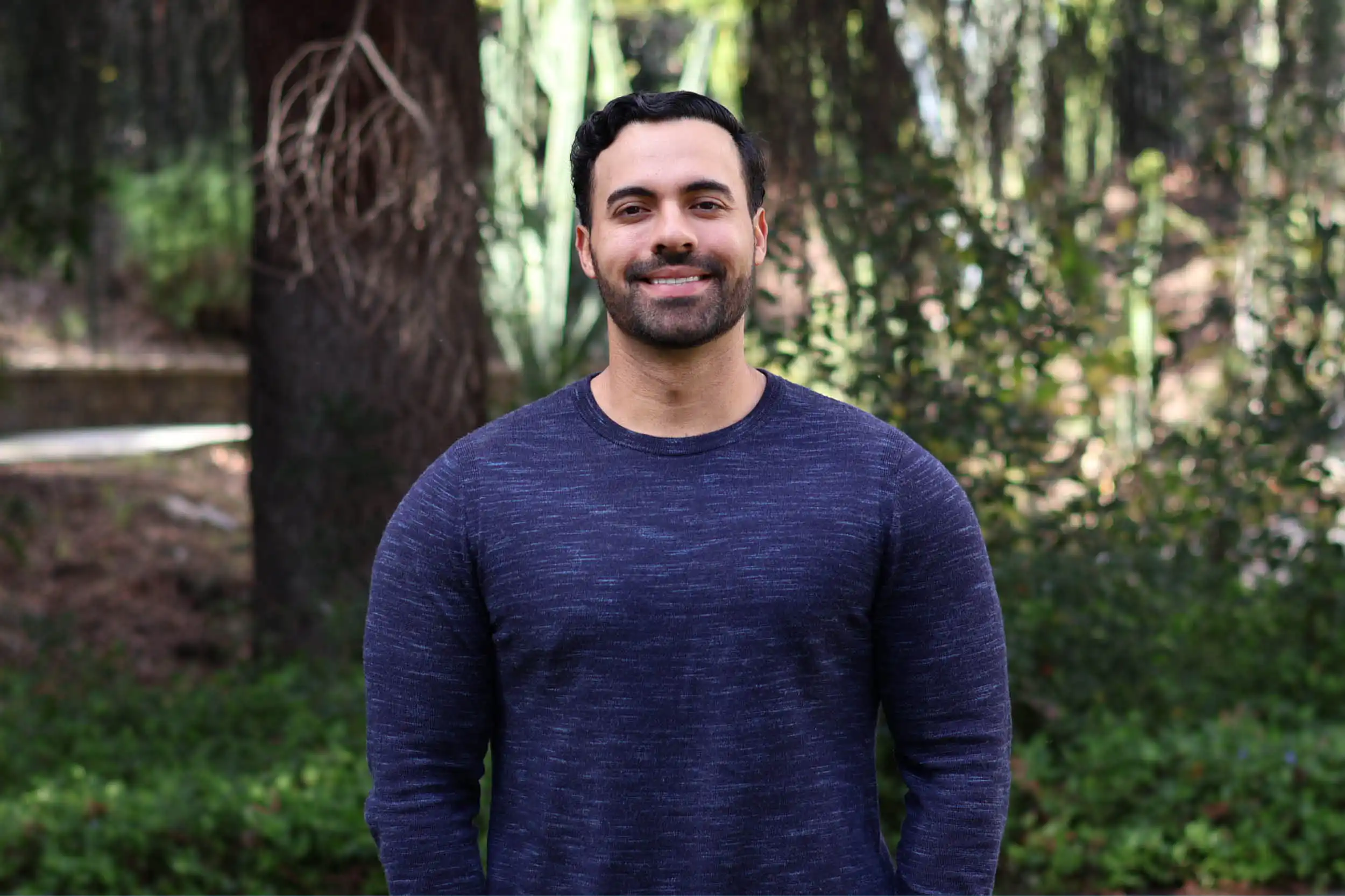 lucas's wearing blue and smiling