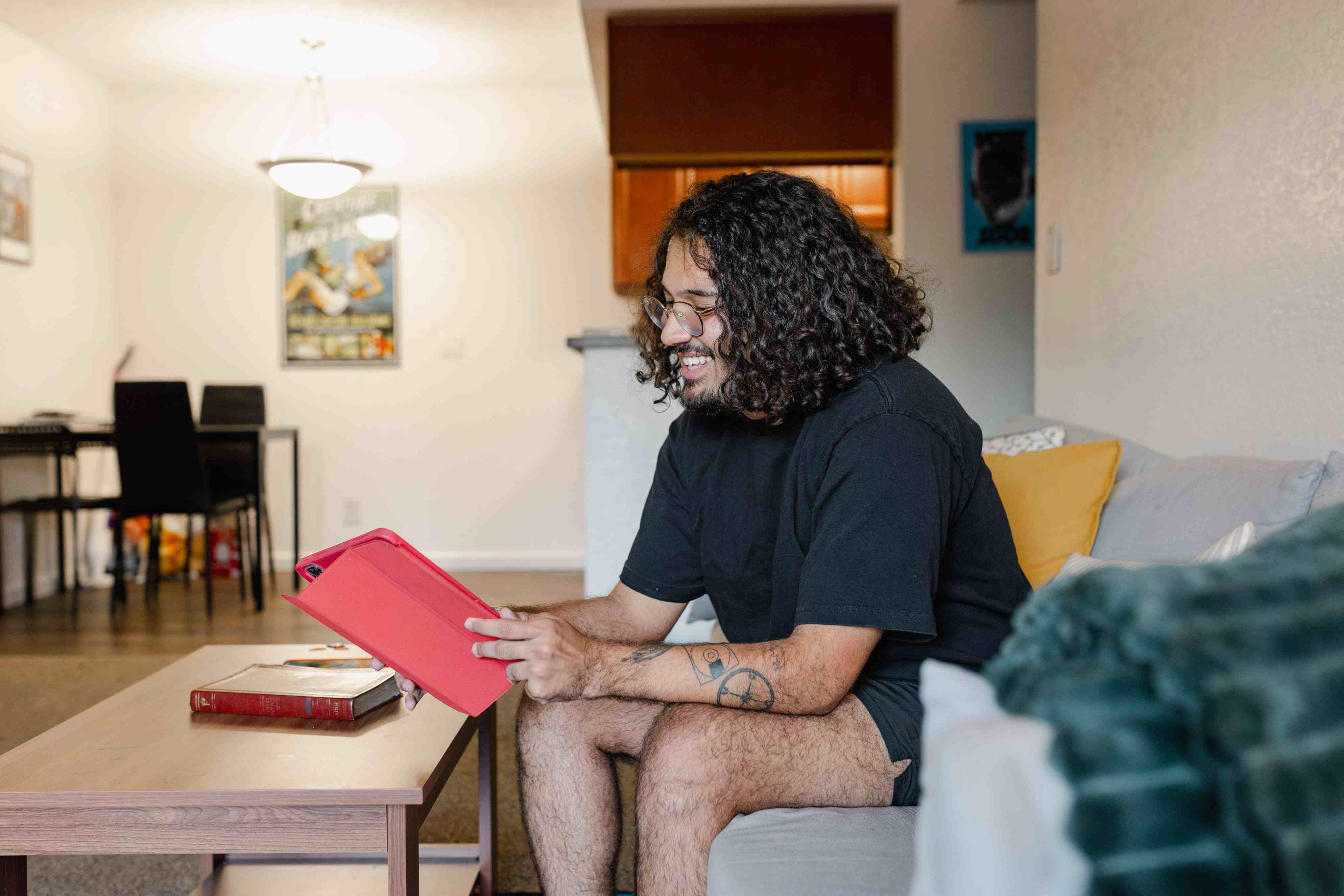 student smiling in the living room