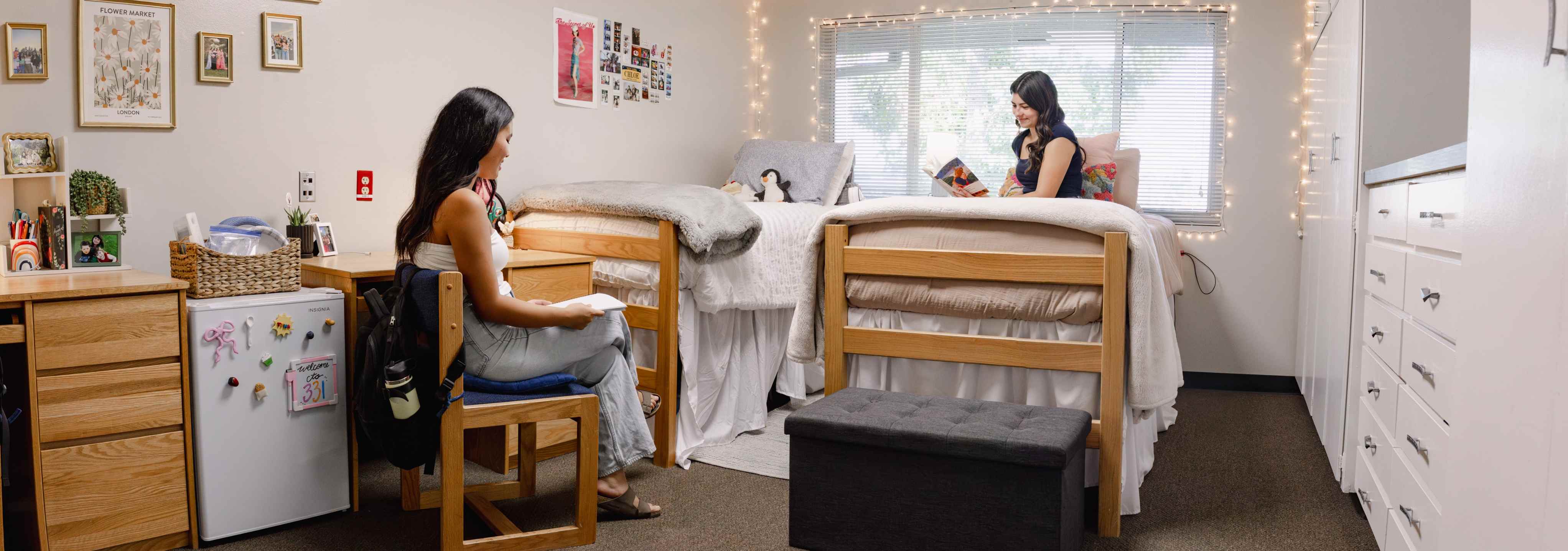 students inside adams hall bedroom