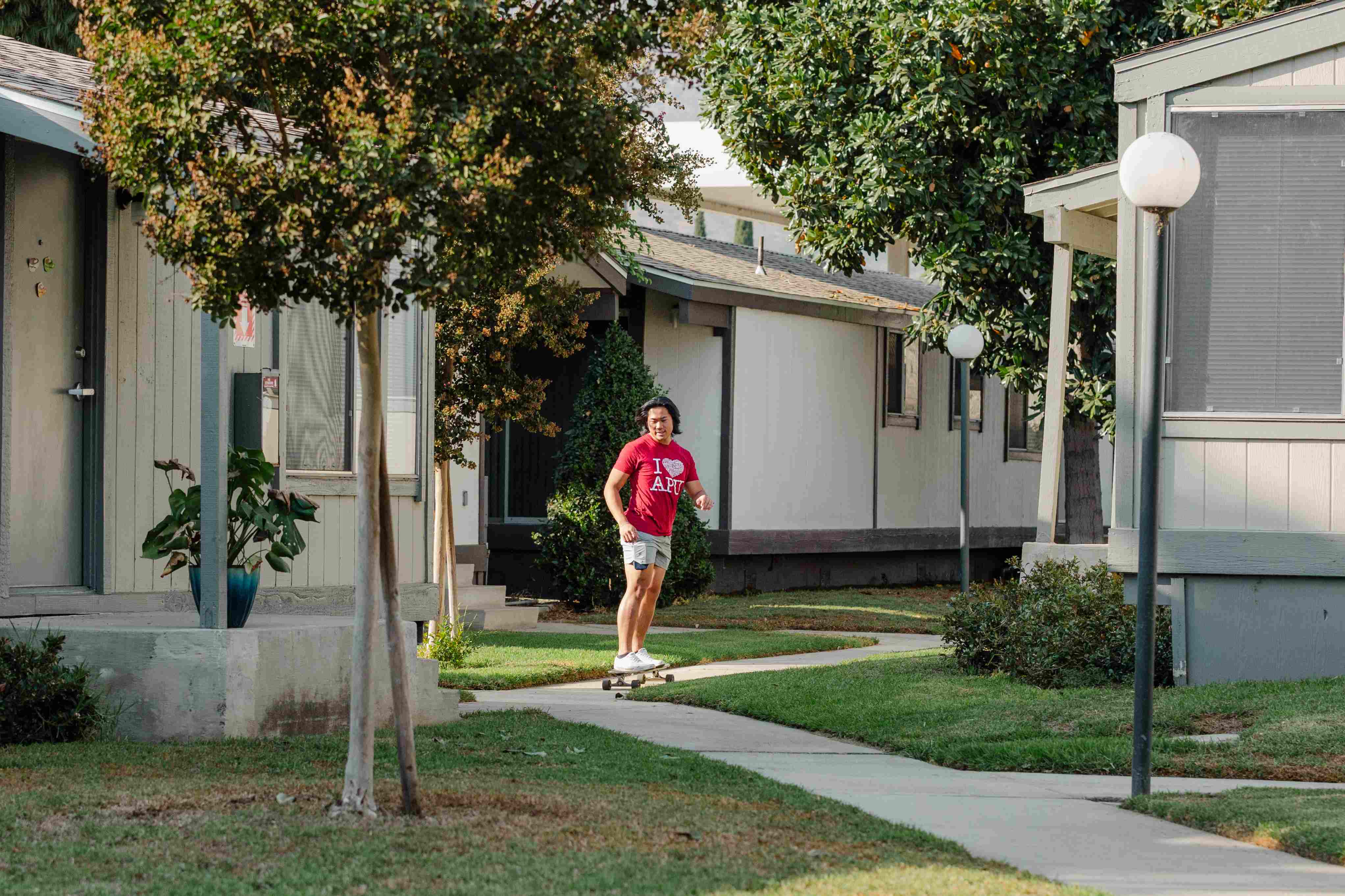 a student riding his skateboard