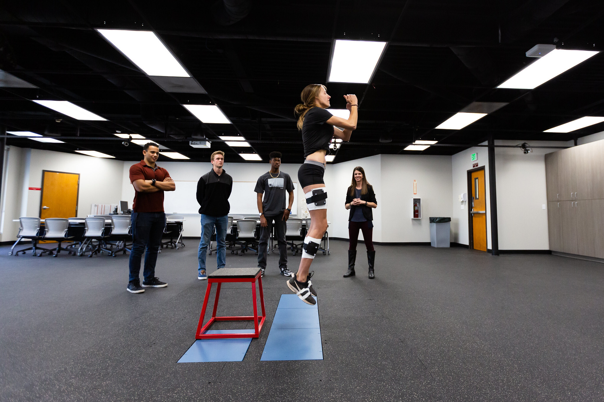 Woman jumping during exercise research